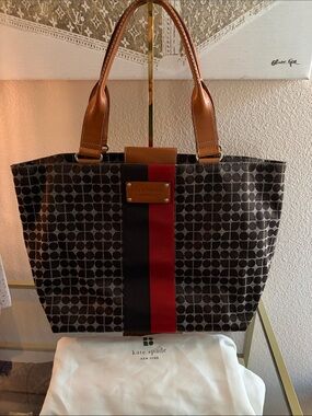 kate spade original logo tote with cognac leather trim.